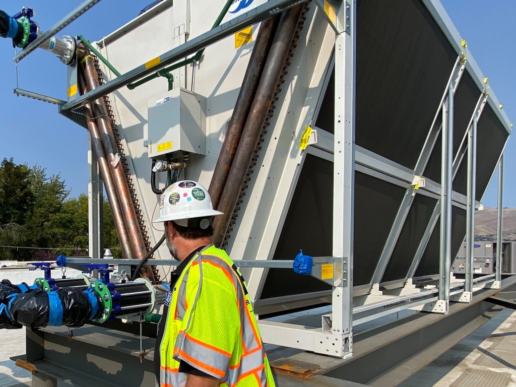 Worker installing equipment